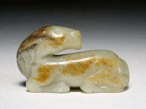 Nephrite recumbent horse, 17th/18th century, 7cm long. Fitzwilliam Museum Cecil E. Byas Bequest.